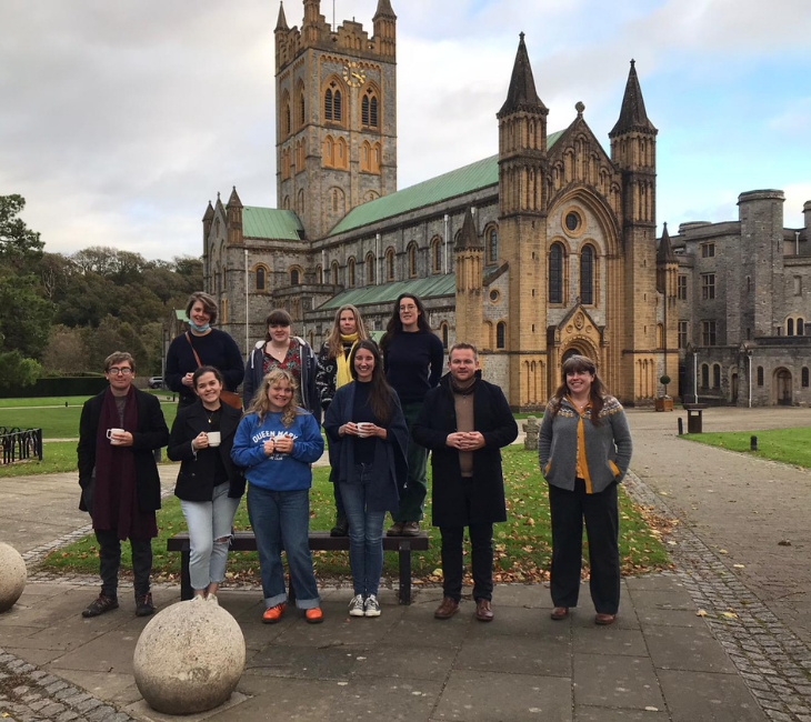 Understanding Change Research Cluster enjoying hot drinks in the grounds of Buckfast Abbey